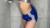 Myxxxy wetting her shiny nylon Shorts