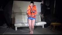 Sexy Jill shows you how to enjoy putting on and wear a lifevest over an bikini and a shiny nylon shorts (Video)