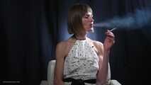 34 years old lady is smoking cork 100mm cigarette