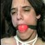 26 Yr OLD K-MART CLERK IS BALL-GAGGED, TIT-TIED, BALL-TIED,  ONE BAREFOOT & ONE NYLON STOCKING AND PLUG-GAGGED (D49-5)
