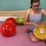 popping water balls with fingernails
