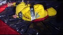 Sonja tied, gagged and hooded on bed with tape wearing a supersexy yellow rainwear combination (Video)