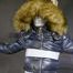 Lana tied and gagged in a shiny nylon Downjacket