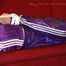 Simone tied and gagged in shiny nylon shorts