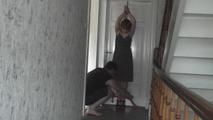 Kim tied to the door