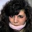 35 YEAR OLD ITALIAN HAIRDRESSER IS CLEAVE GAGGED, MOUTH STUFFED WITH PANTIES, GAG TALKING, BLINDFOLDED WHILE TIGHTLY TIED TO A CHAIR (D74-8)