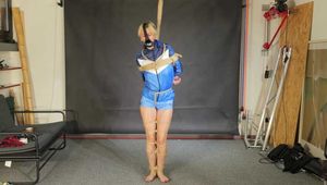 Myxxxy bound, gagged and spanked in a shiny nylon Shorts and Windbreaker