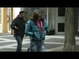 Alina walking on the street cruising around wearing sexy shiny nylon shorts under her jeans and a rain jacket (Video)