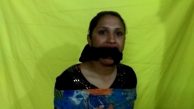 Cheri bound and gagged in borka