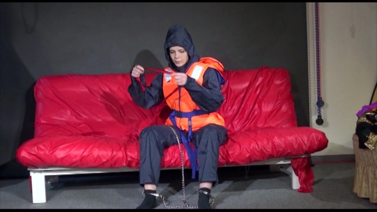 *** Hot Hot Hot*** New Modell*** Destiny Wearing A Sexy Red/Darkblue Shiny Nylon Rain Suit Ties And Gagges Herself With Cuffs And A Cloth Gag (Video)