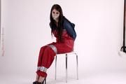 Shelly bound and gagged in shiny nylon rainwear