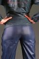 Alina posing in a studio wearing a supersexy darkblue rainwear combination (Pics)