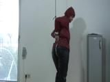 Video with one of our archive girls tied and gagged in shiny nylon rainwear