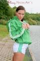 Enni having a good time outdoor wearing sexy shiny nylon shorts and a top posing for the camera (Pics)