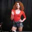 Skinny girl with wild red hair loves smoking a 120mm between the shooting