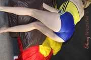 ***NEW MODELL MIA*** wearing a sexy yellow/blue shiny nylon shorts and a yellow top preparing her bed and changing cloths (Pics)