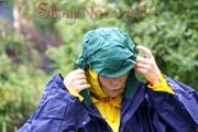 Jill Diamond in the garden playing with water out of the garden hose wearing supersexy shiny nylon rainwear and a rain cape (Pics)