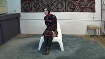 Ana in shiny raincoat bondage