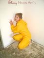 Leonie wearing a super sexy yellow rainwear combination posing outdoor (Pics)