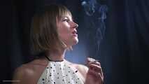 34 years old lady is smoking cork 100mm cigarette