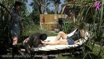 On the sun lounger #footworship #doubledomme and #rubberboots