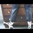 03:00 Min. video with Shelly tied and gagged in shiny nylon rainwear