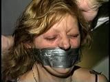43 YEAR OLD WAITRESS IS TAPE HOG-TIED, BAREFOOT, TOE-TIED & WRAP TAPE GAGGED (D65-8)