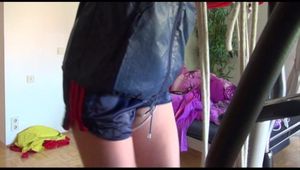 Pia tied and gagged on a crosstrainer for doing her workout well wearing a hot shiny nylon shorts and a rain jacket (Video)
