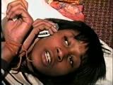 BLACK FEISTY & CUTE SARAH IS TAPE GAGGED, MOUTH STUFFED, TIED WITH RAWHIDE & TIGHTLY HANDGAGGED (D53-16)
