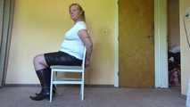 Cuffed on a chair 002
