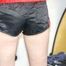 HOTHOTHOT DESTINY folding clothes wearing high heels and a shiny nylon shorts and a rain jacket (Pics)