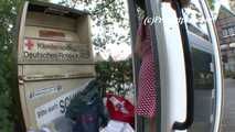 068008 Ling Floods A Phone Box With Pee