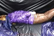 Samantha tied and gagged in shiny nylon downwear
