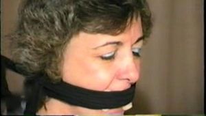 47 YEAR OLD LIBRARIAN PANTYHOSE HOG-TIED HOSTAGE (D18-15)