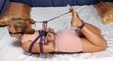 Albina Rose hogtied
