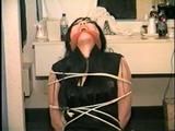 30 YR OLD ASIAN LI-JUN IS CLEAVE GAGGED, TIED TO CHAIR, LOTS OF WIDE EYED GAG TALKING (D52-11)