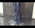 Get an Archive Video with Mara enjoying a shower with her shiny nylon downjacket
