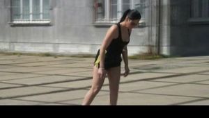 Stella during inline skating wearing shiny nylon shorts and rain jacket (Video)