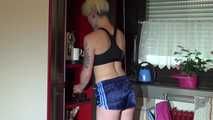Watching sexy COURTNEY wearing a darkblue shiny nylon shorts and a top while preparing coffee and doing her housework (Video)