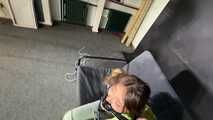 Marie bound and gagged in a shiny nylon Downjacket
