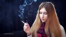 Mysterious girl Valya poses on camera with a tasty 120mm cigarette