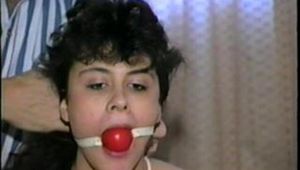 CROTCH ROPED, BALL-GAGGED, BED BOUND LATINA ANGEL (D25-3)