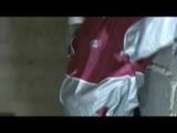 Nicole tied and gagged in a beautiful shiny silver/red PVC suit by Sophie in the cellar (Video)