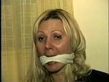 29 Yr OLD SEXY ROMANIAN TAPES AND CLEAVE GAGS HERSELF, HOPS AROUND THE ROOM BAREFOOT & IS CLEAVE GAGGED 3 MORE TIMES (D53-12)