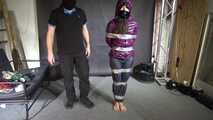 Aiyana bound, gagged, vibed and satisfied :) in a shiny nylon Downjacket
