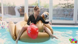 666 Foxy Sanie has fun in the swimming pool.