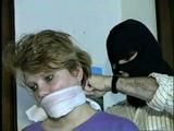 22 Yr OLD LISA IS RUBBER BAND BALL-GAGGED, MOUTH STUFFED, HANDGAGGED, OTM & CLEAVE GAGGED (D43-6)