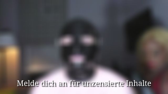 Huge rubber hands in the gimp’s mouth