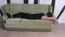 Aurora roped on couch 2/2