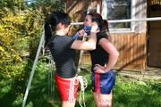 Jill tied and gagged by her friend in shiny nylon shorts